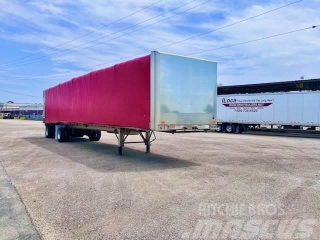 East Mfg FLATBED WITH ROLLING TARP Curtainsider trailers