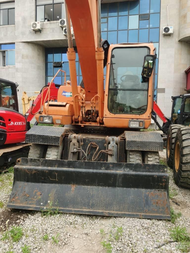 Doosan DH 210 W-7 Kolesové rýpadlá