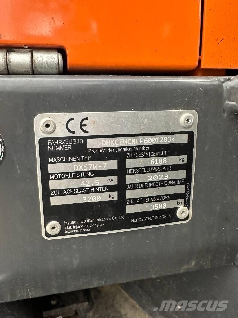 Develon DX 57 W-7 Kolesové rýpadlá