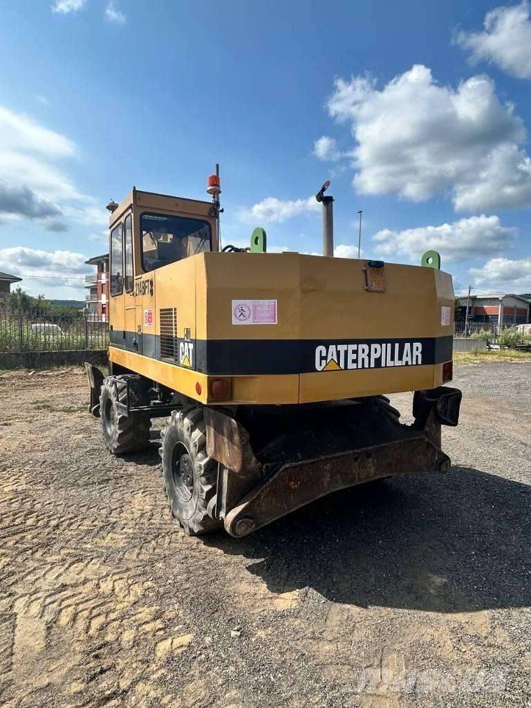 CAT 214 Kolesové rýpadlá