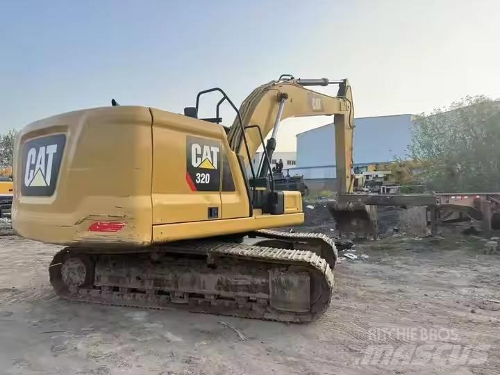CAT CAT323GX Pásové rýpadlá