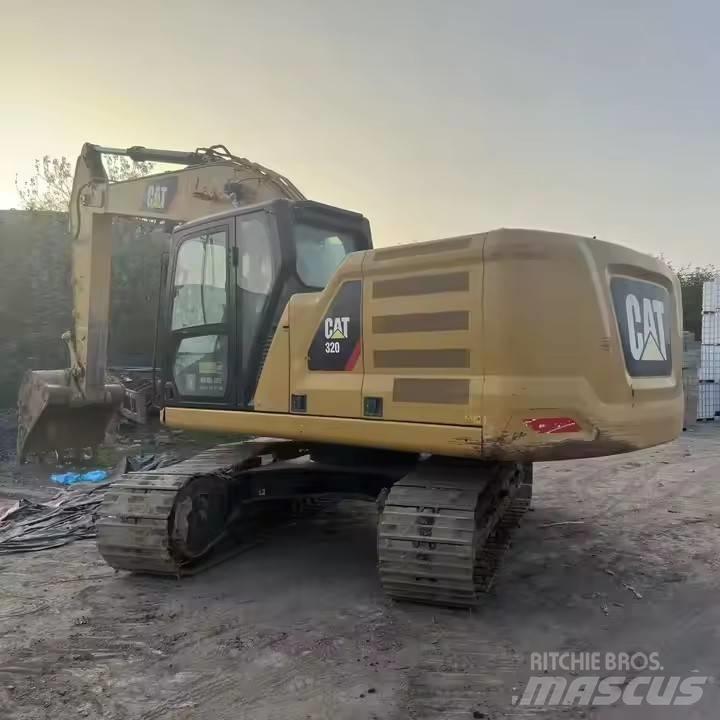CAT CAT323GX Pásové rýpadlá