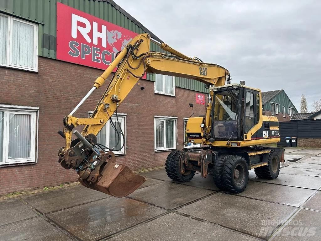 CAT M315 +ROTO CE Kolesové rýpadlá