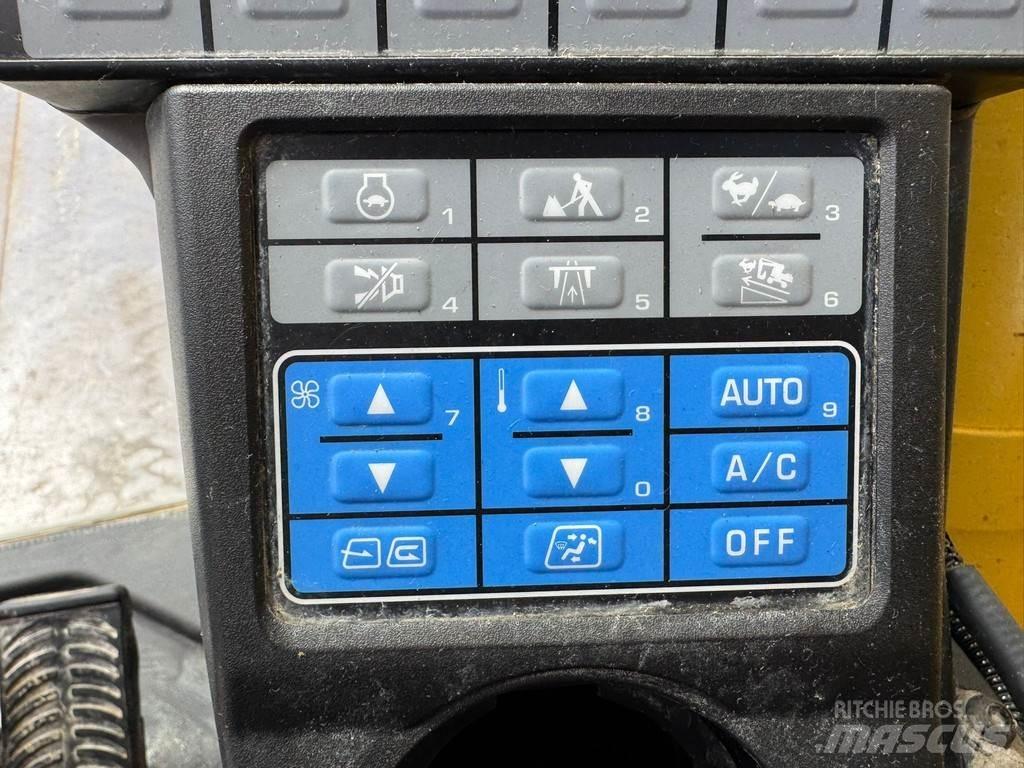 Komatsu PW180-11 Kolesové rýpadlá