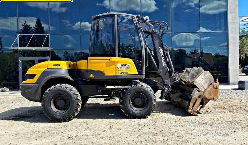 Mecalac 12 M TX Rýpadlo-nakladače