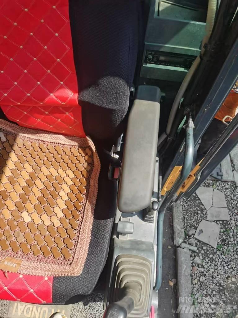 Hyundi 210w-9 Kolesové rýpadlá