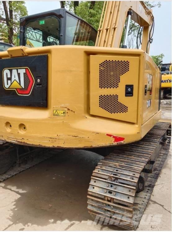 CAT 310 Pásové rýpadlá