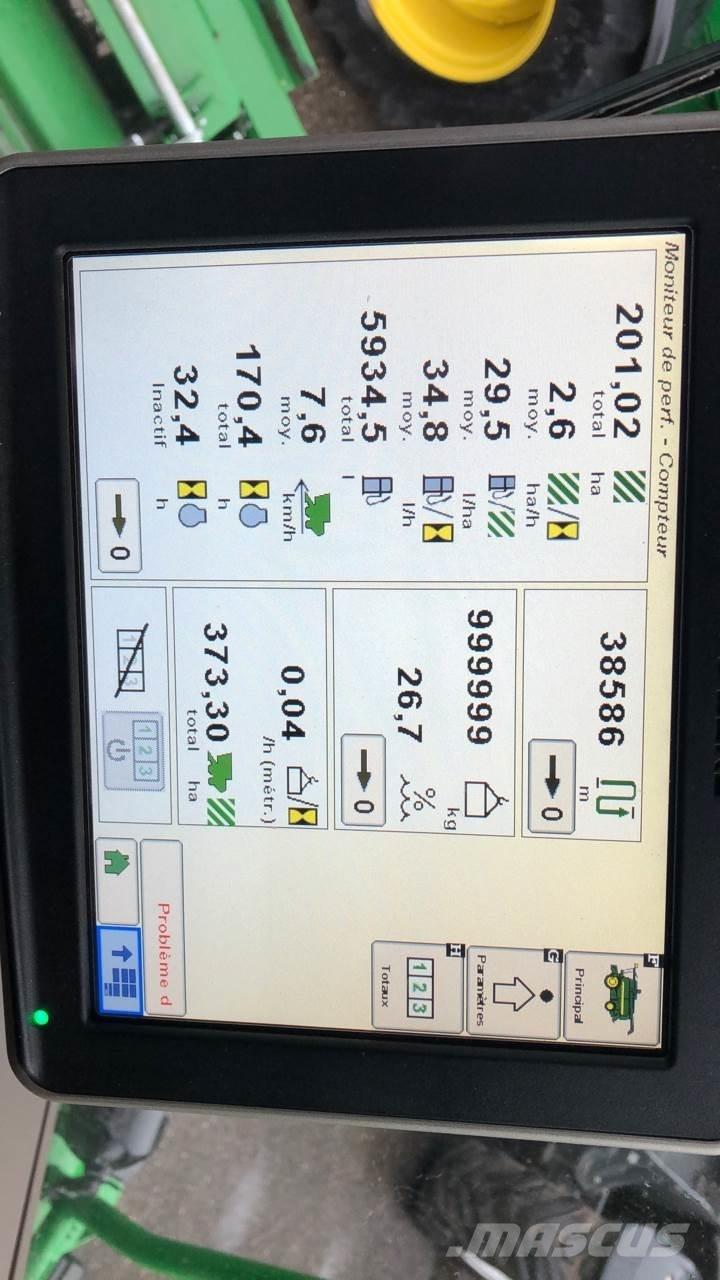 John Deere T560 HM Kombinované zberacie stroje