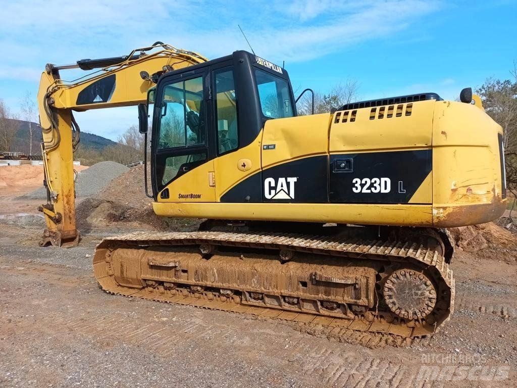 CAT 323 DL Pásové rýpadlá