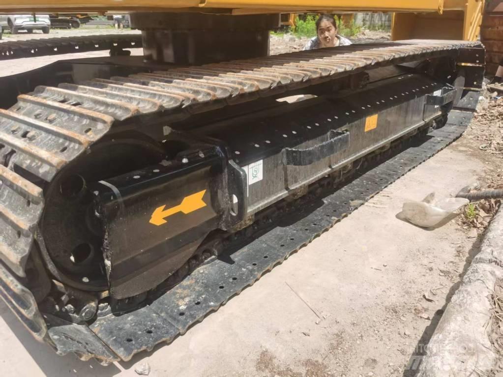 CAT 310 Pásové rýpadlá