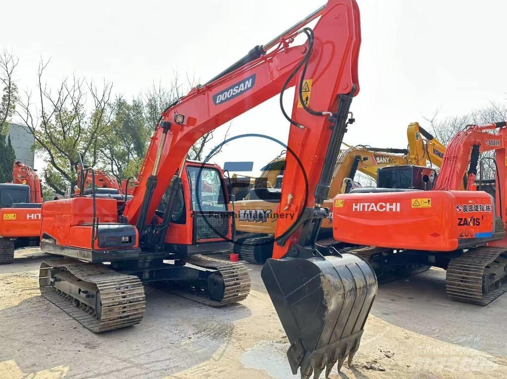 Doosan DX 140 Pásové rýpadlá