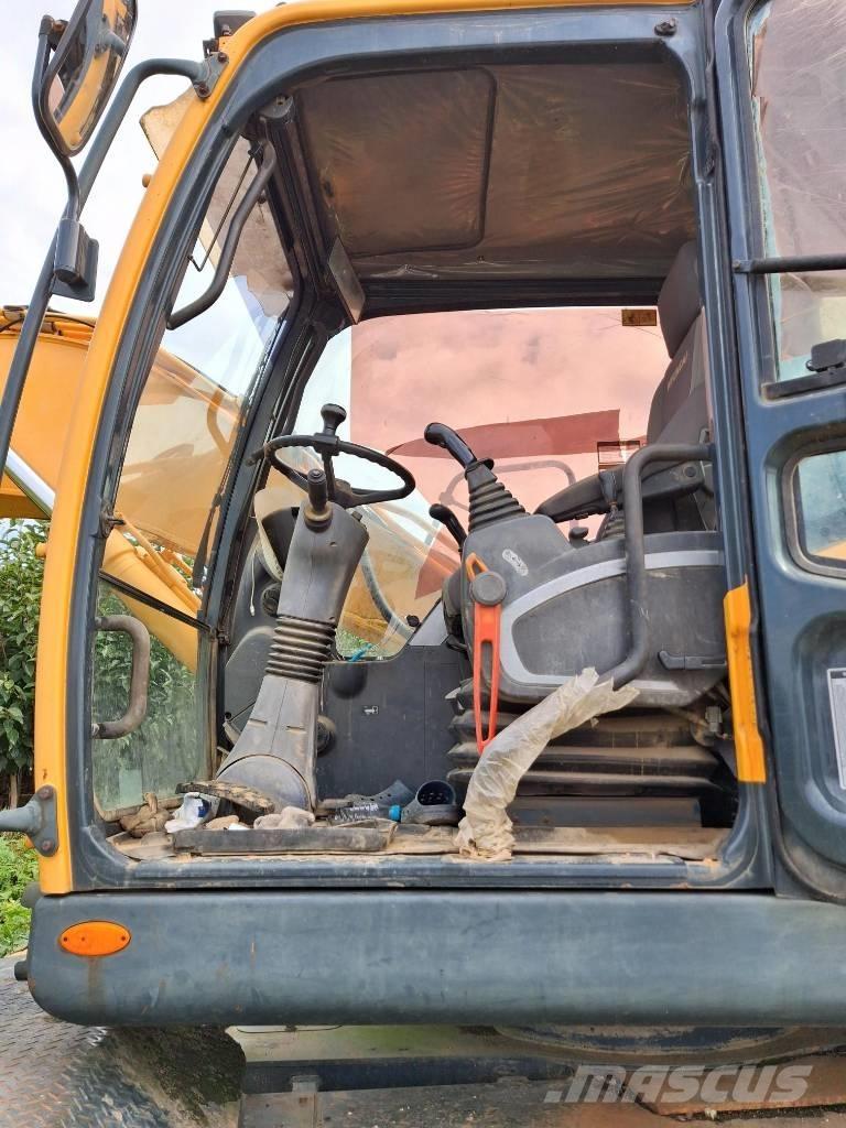 Hyundai Robex 140 W Kolesové rýpadlá