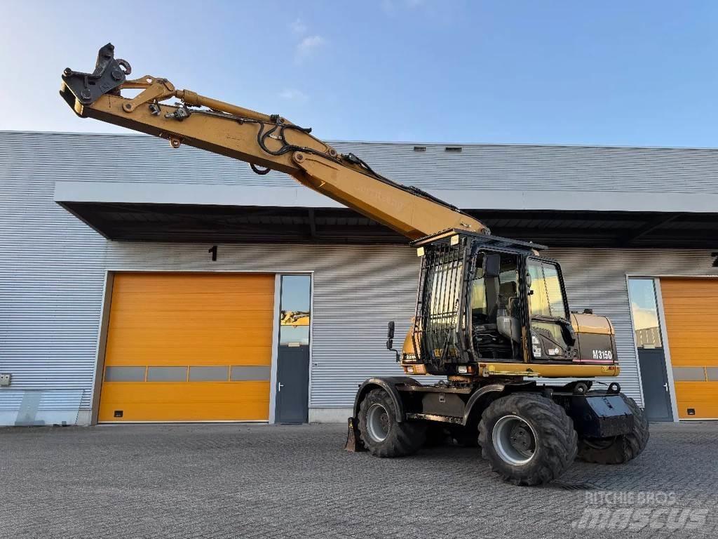 CAT M315C Kolesové rýpadlá