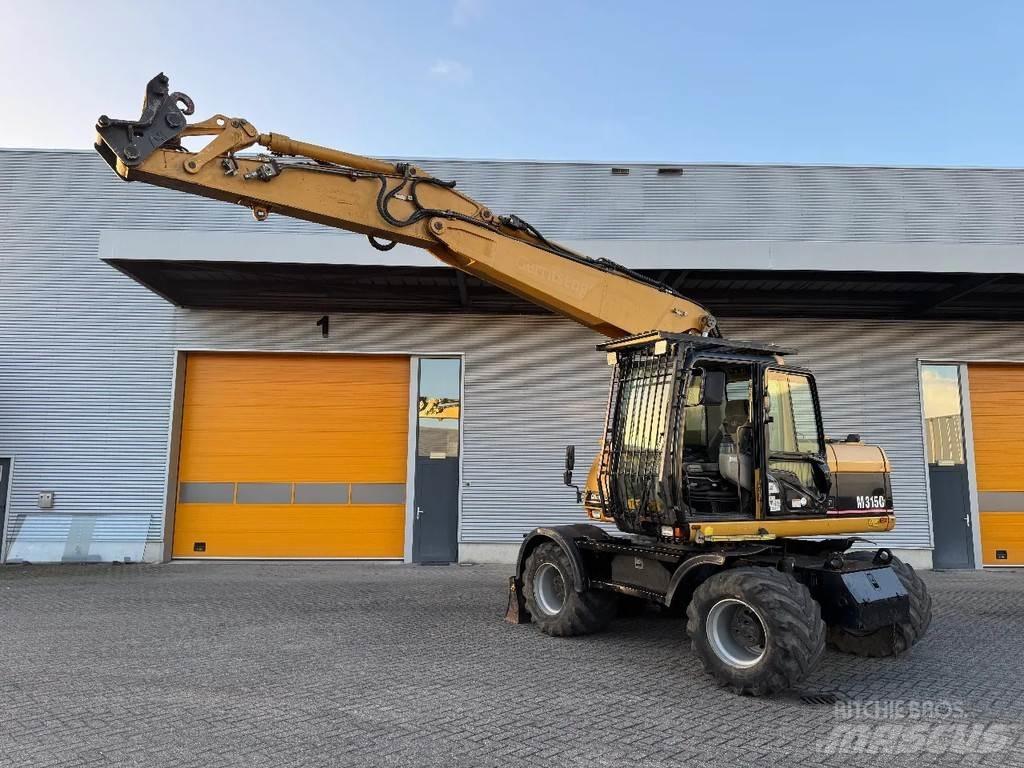 CAT M315C Kolesové rýpadlá
