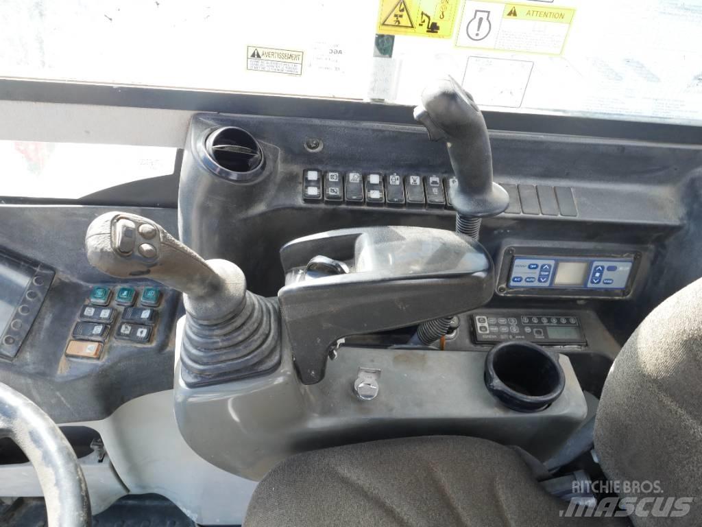 Takeuchi TB 295 W Kolesové rýpadlá