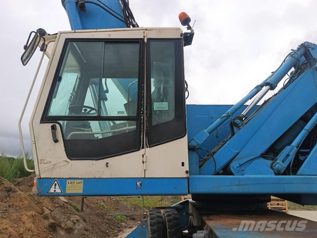 Fuchs MHL 360 Stroje pre manipuláciu s odpadom