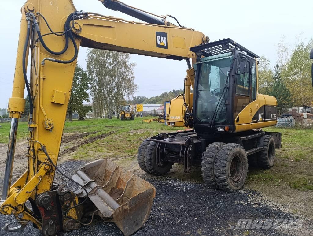 CAT M 318 C Kolesové rýpadlá