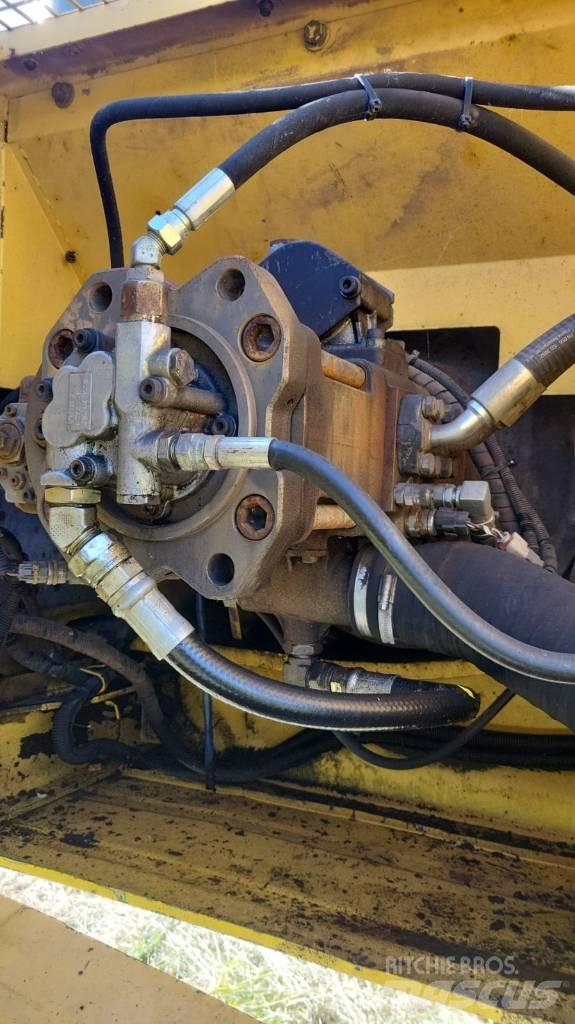 New Holland 335 Pásové rýpadlá