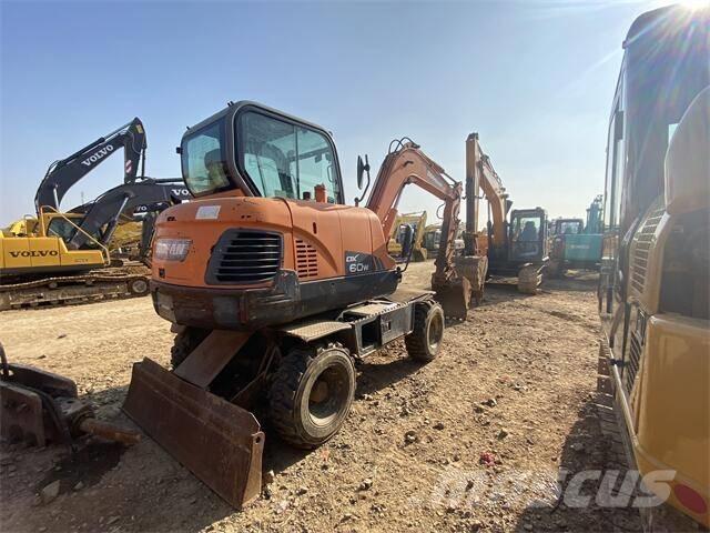 Doosan DX60W Kolesové rýpadlá