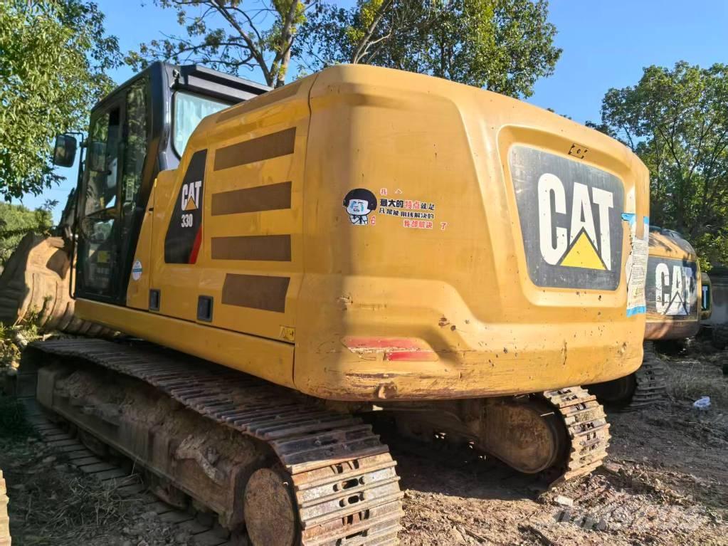 CAT 323 Pásové rýpadlá
