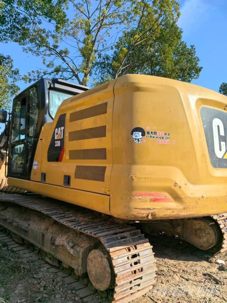 CAT 323 Pásové rýpadlá