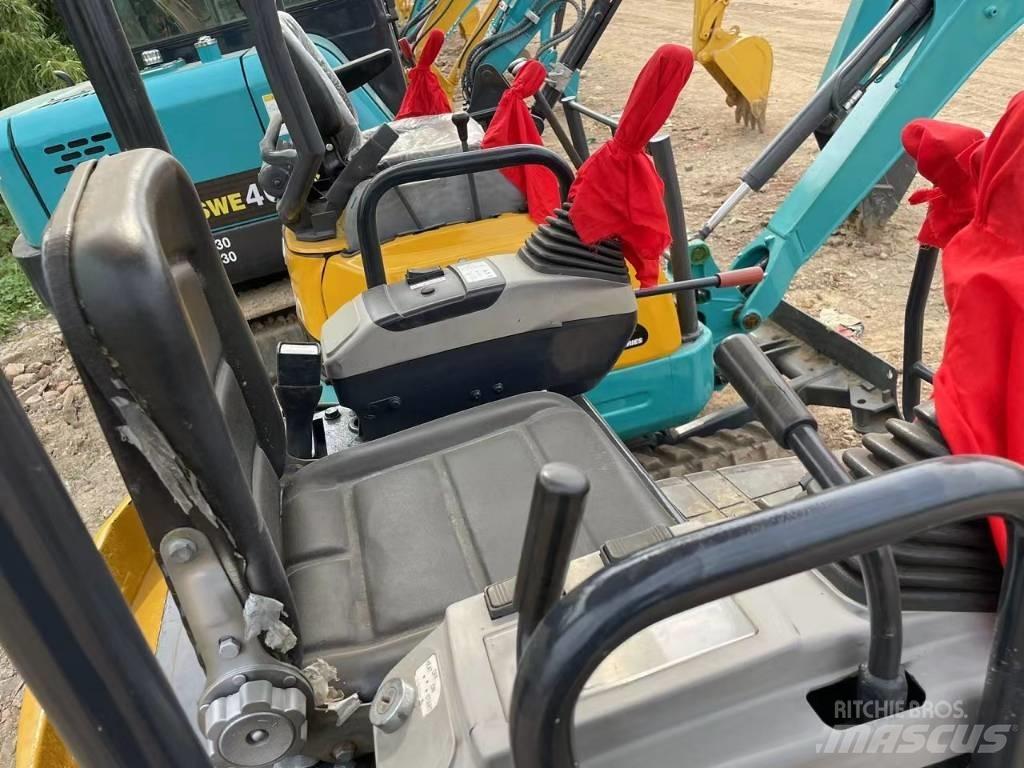 Komatsu PC18 Pásové rýpadlá