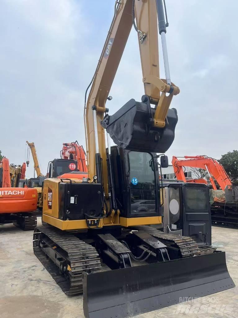 CAT 310 Pásové rýpadlá