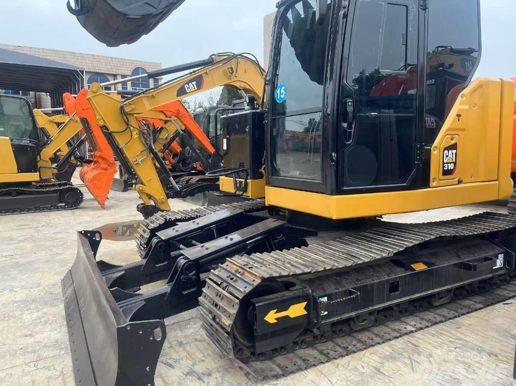 CAT 310 Pásové rýpadlá