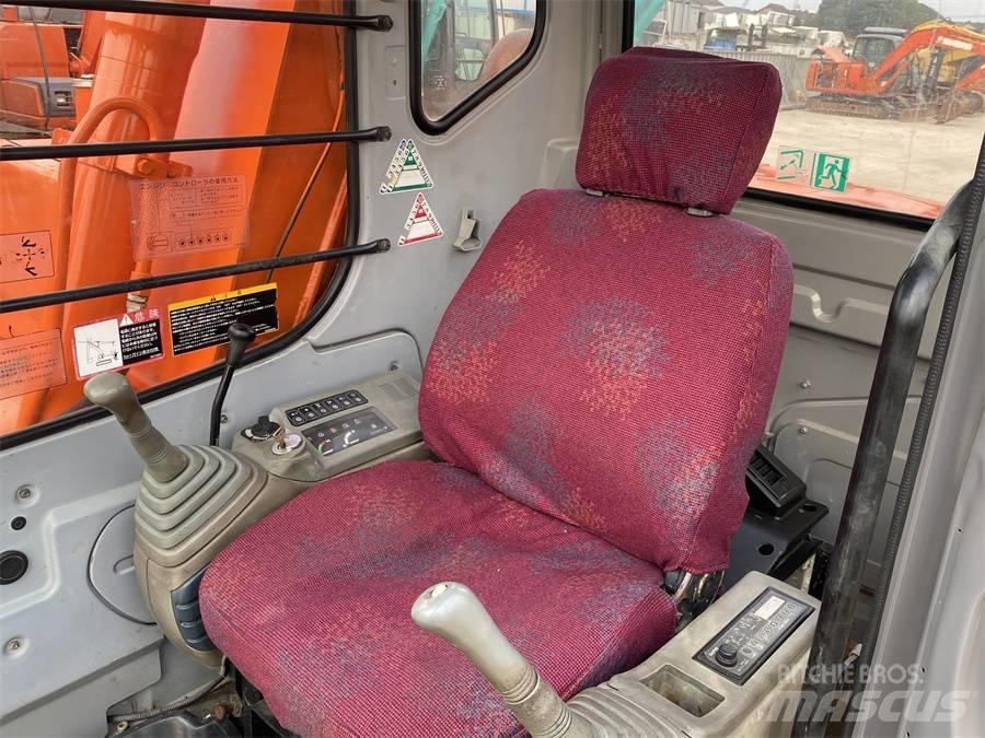 Hitachi EX60 Pásové rýpadlá