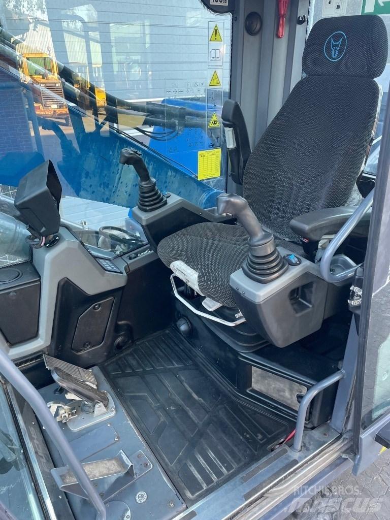 Fuchs MHL320F Stroje pre manipuláciu s odpadom