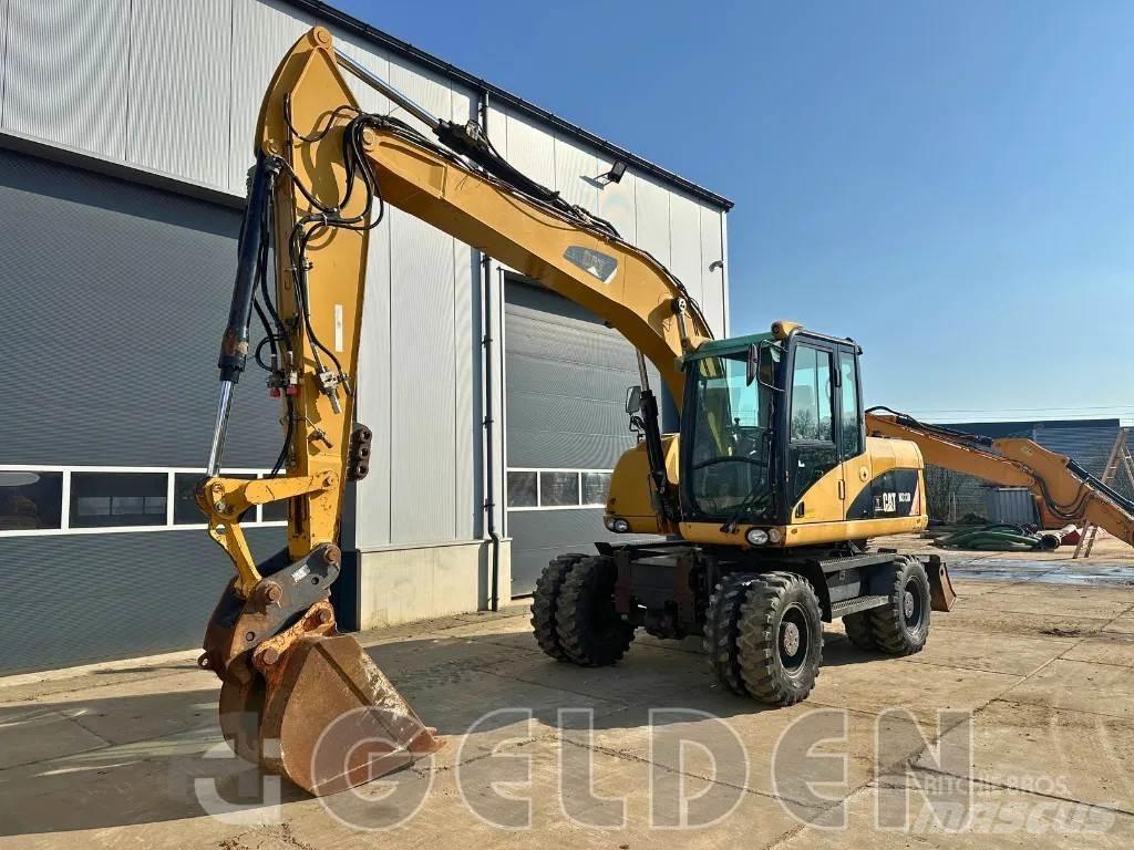 CAT M313D Kolesové rýpadlá