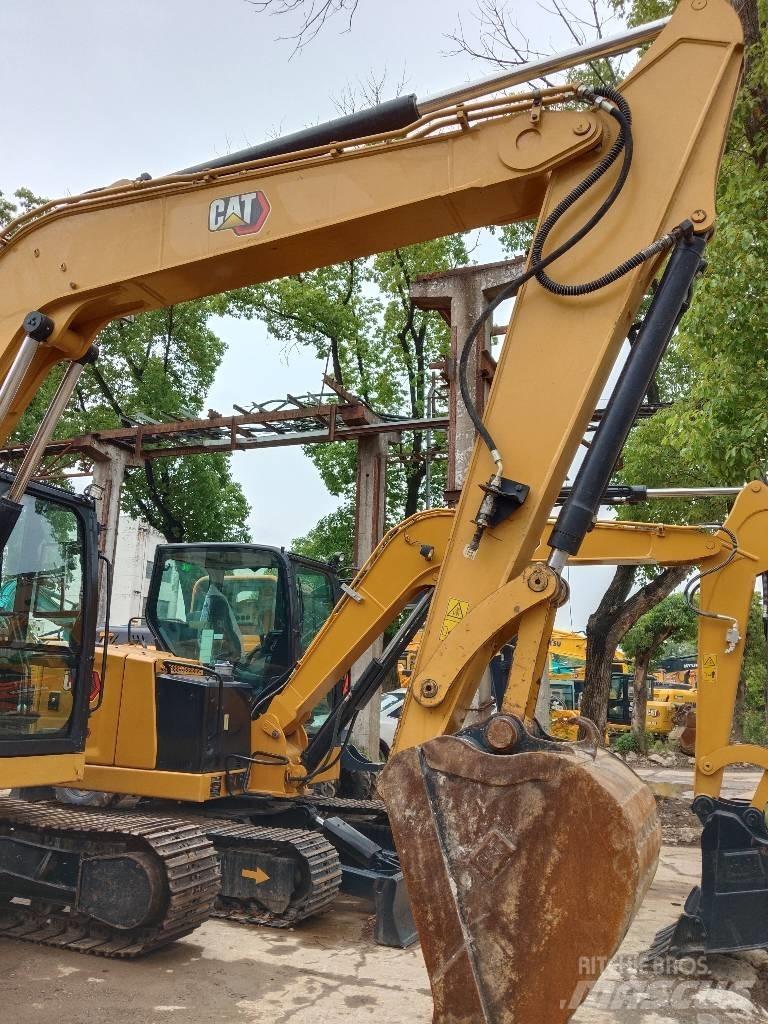 CAT 310 Pásové rýpadlá
