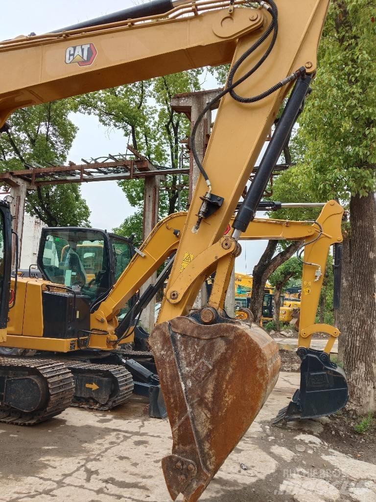 CAT 310 Pásové rýpadlá