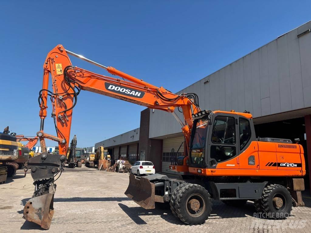 Doosan DX 210 W Kolesové rýpadlá