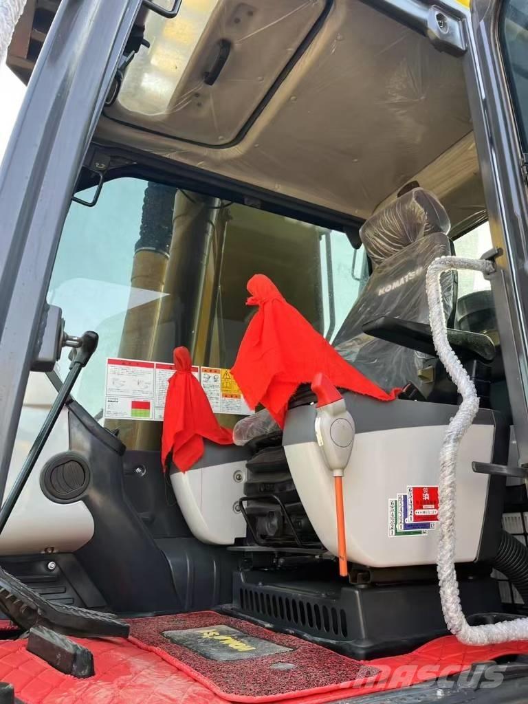 Komatsu 240-8 Pásové rýpadlá