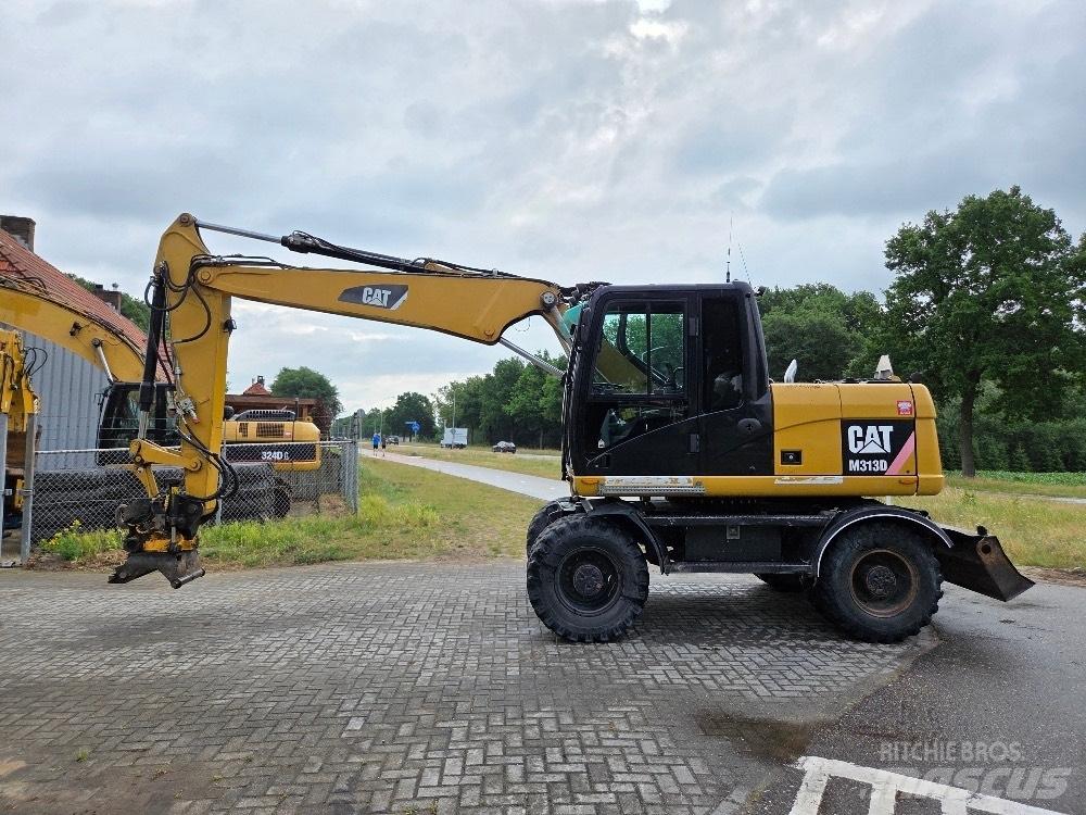 CAT M313D Kolesové rýpadlá