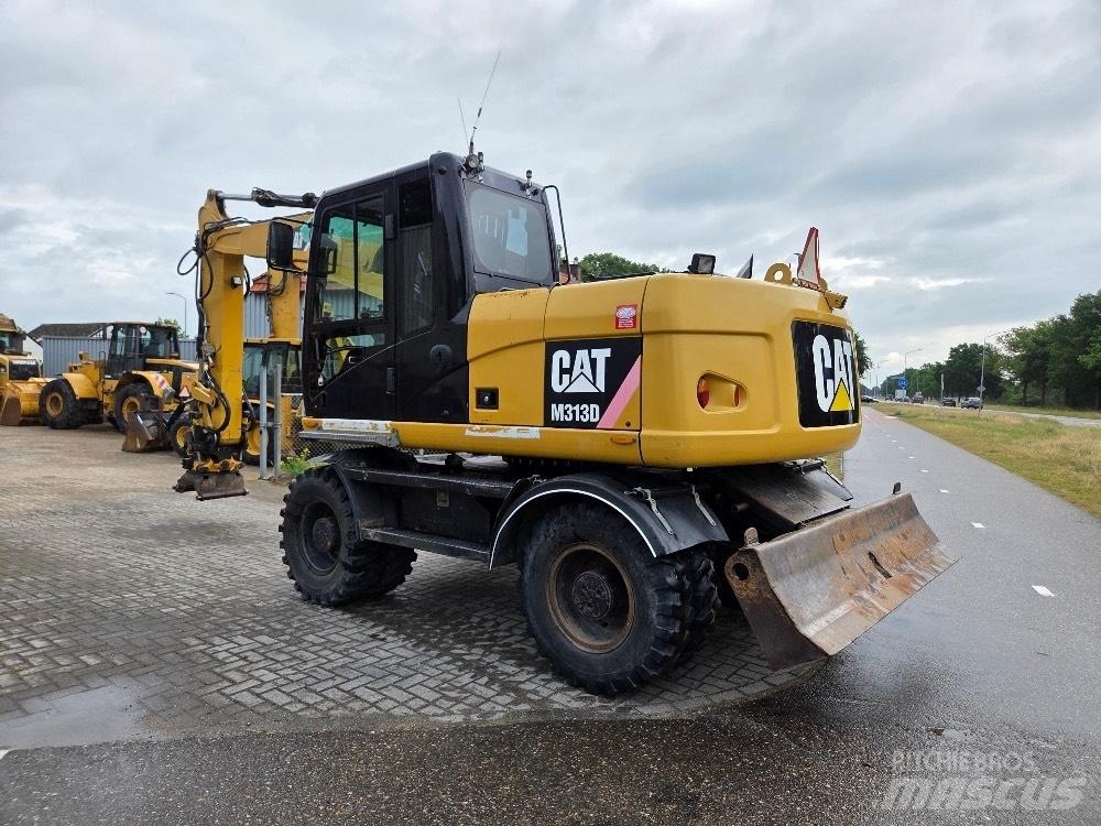 CAT M313D Kolesové rýpadlá