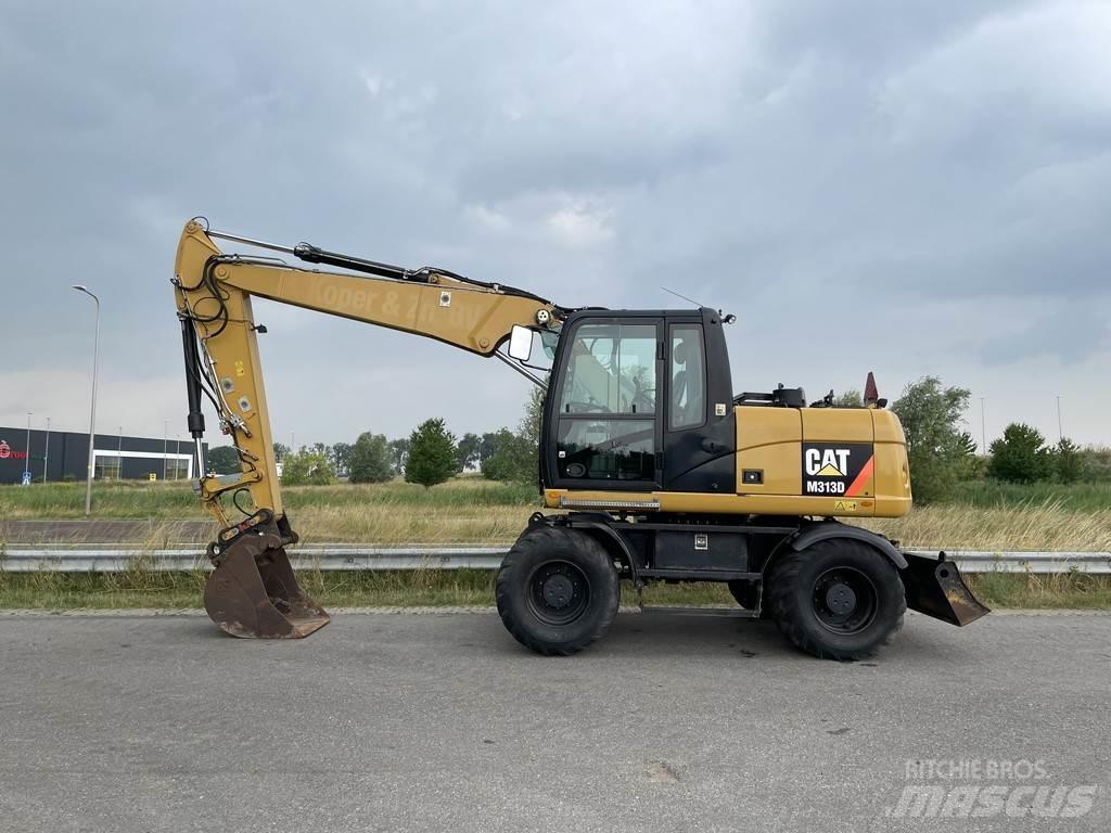 CAT M313D - CE Kolesové rýpadlá
