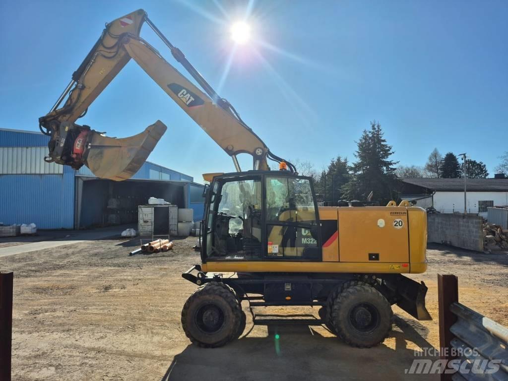 CAT M322F Kolesové rýpadlá