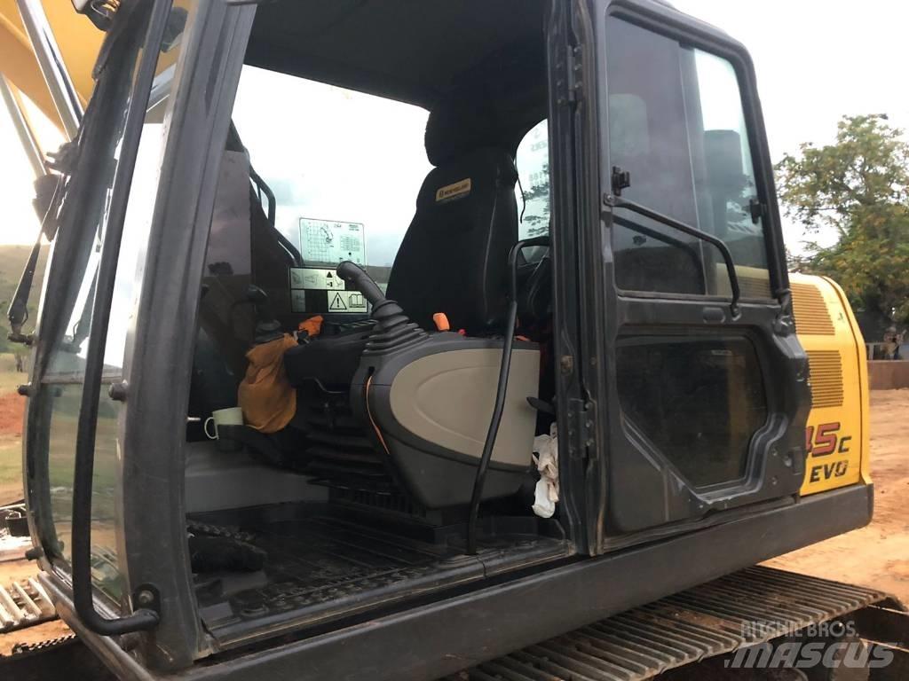New Holland E 145 Pásové rýpadlá