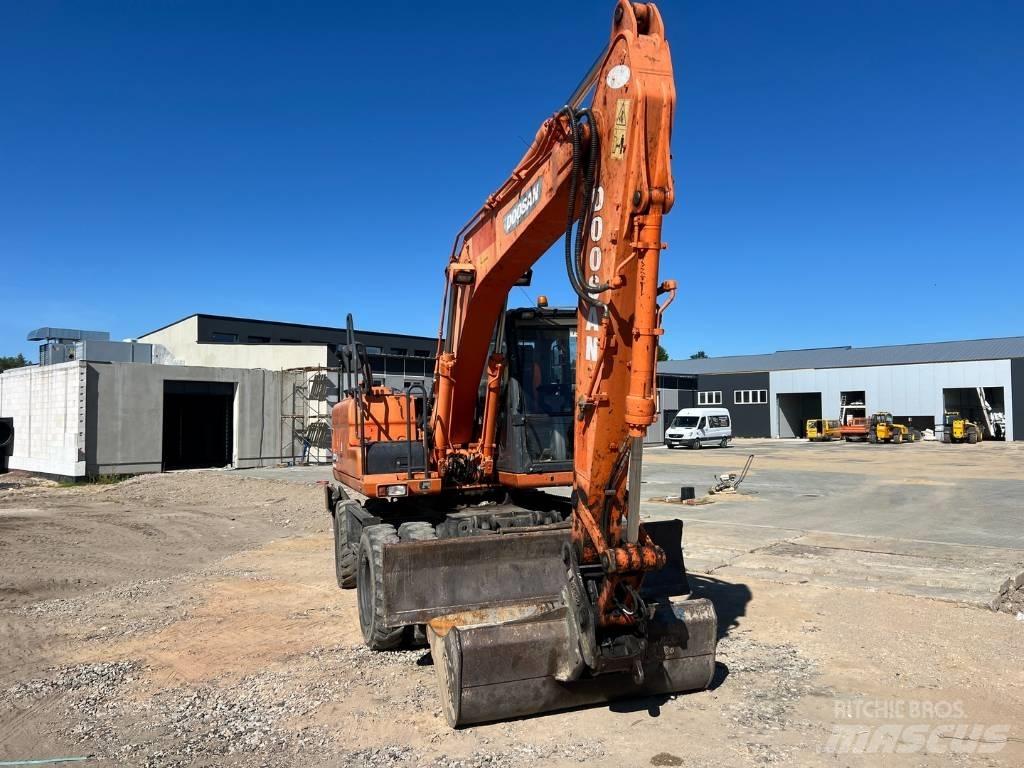 Doosan DX 140 W Kolesové rýpadlá