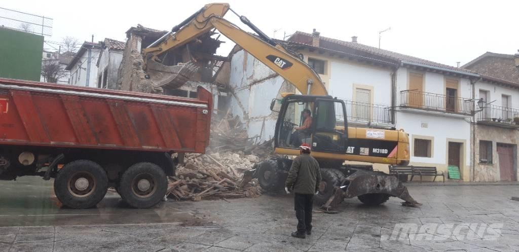 CAT M318d Kolesové rýpadlá