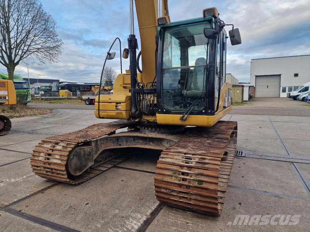 CAT 323d Pásové rýpadlá