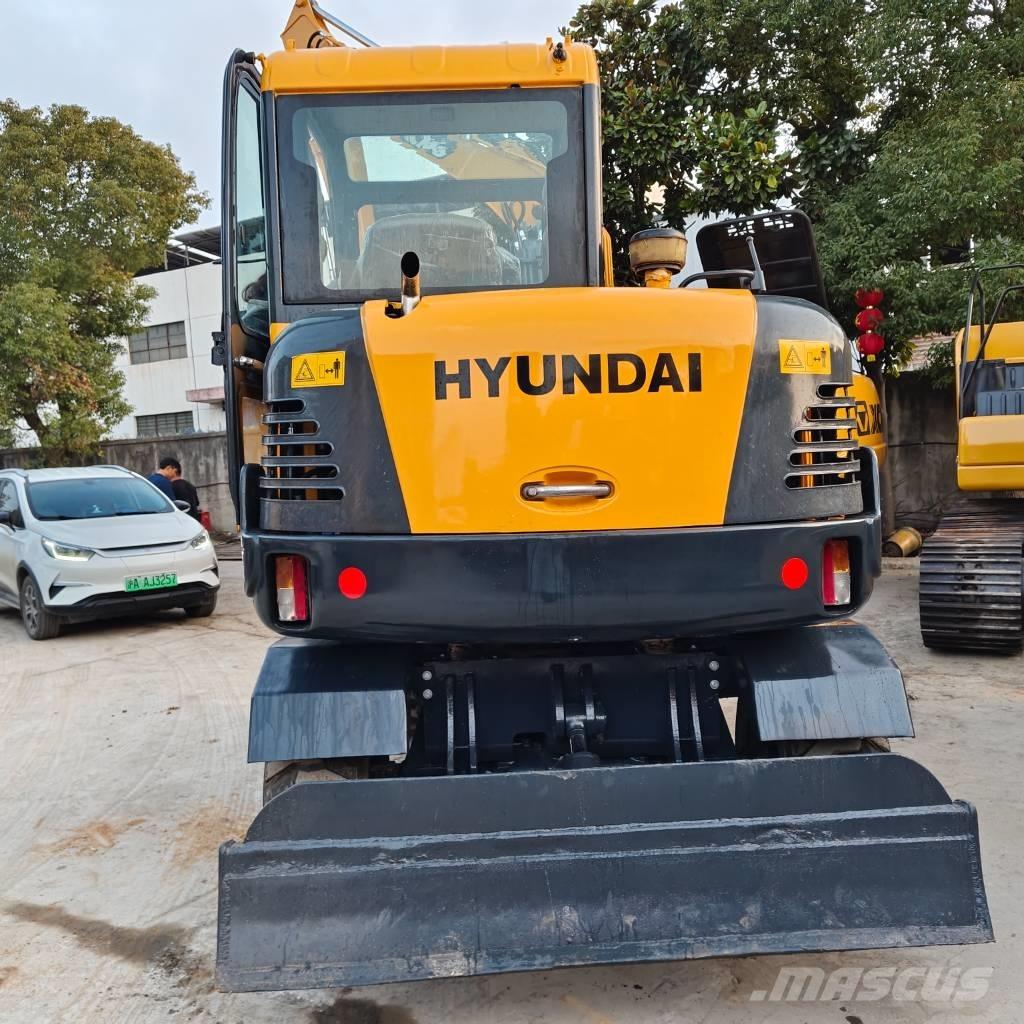 Hyundai 60 W VS Kolesové rýpadlá