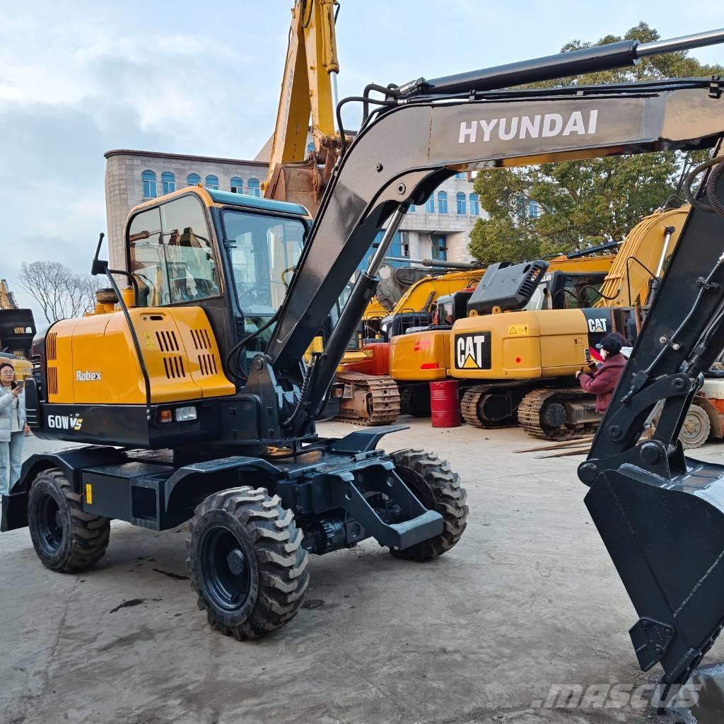 Hyundai 60 W VS Kolesové rýpadlá