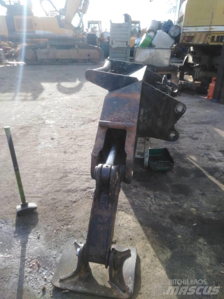 CAT M 318 Podvozky a zavesenie kolies