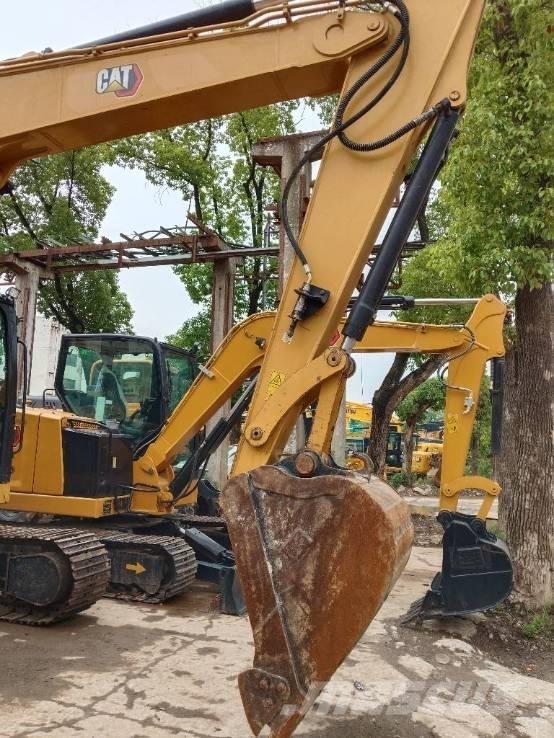 CAT 310 D Pásové rýpadlá