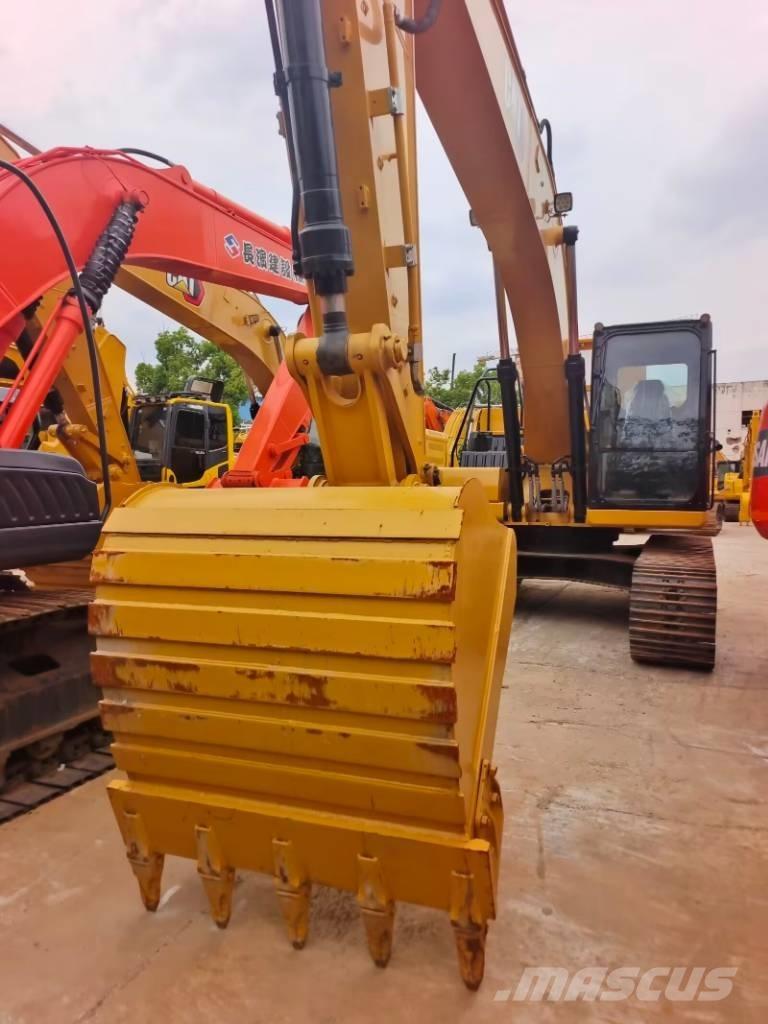 CAT 323 GC Pásové rýpadlá
