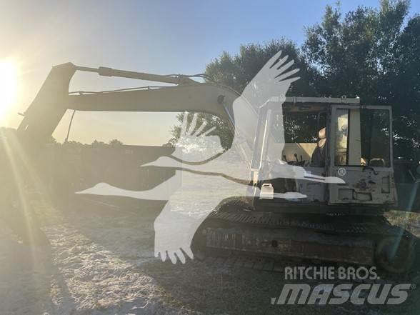 CAT 235B Pásové rýpadlá