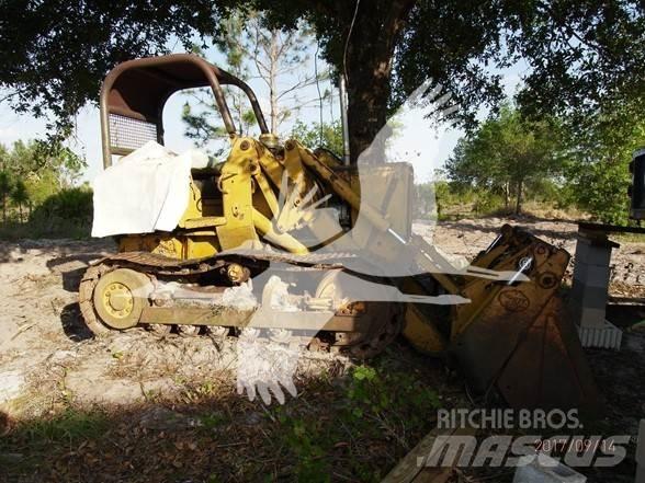 John Deere 450 Pásové nakladače